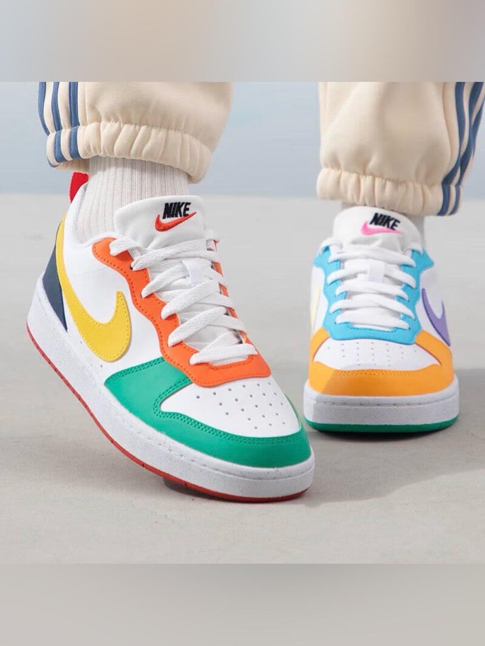 Nike White Low-Top Sneakers with Green, Orange, Yellow & Blue Accents